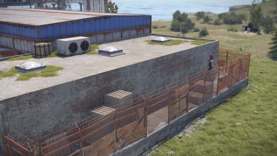 This first building you can climb on top of from jumping up on the fence to loot a crate.