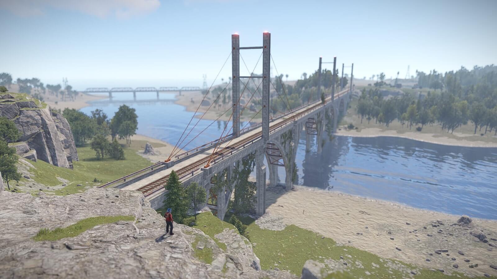 A massive bridge on observer island going over the large river cutting into the map
