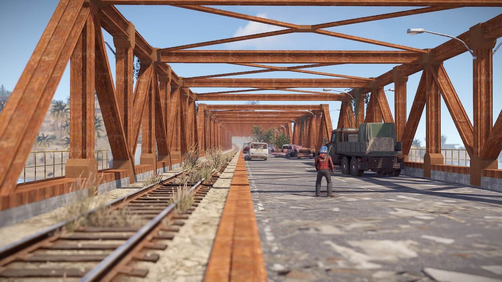 A unique trestle bridge that includes both a roadway as well a train track.