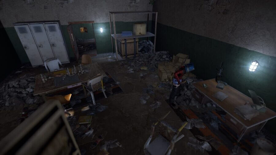 Directly across the hall from the second light switch you'll find the main office. This can spawn a bit of loot, along with the green card on the desk.
