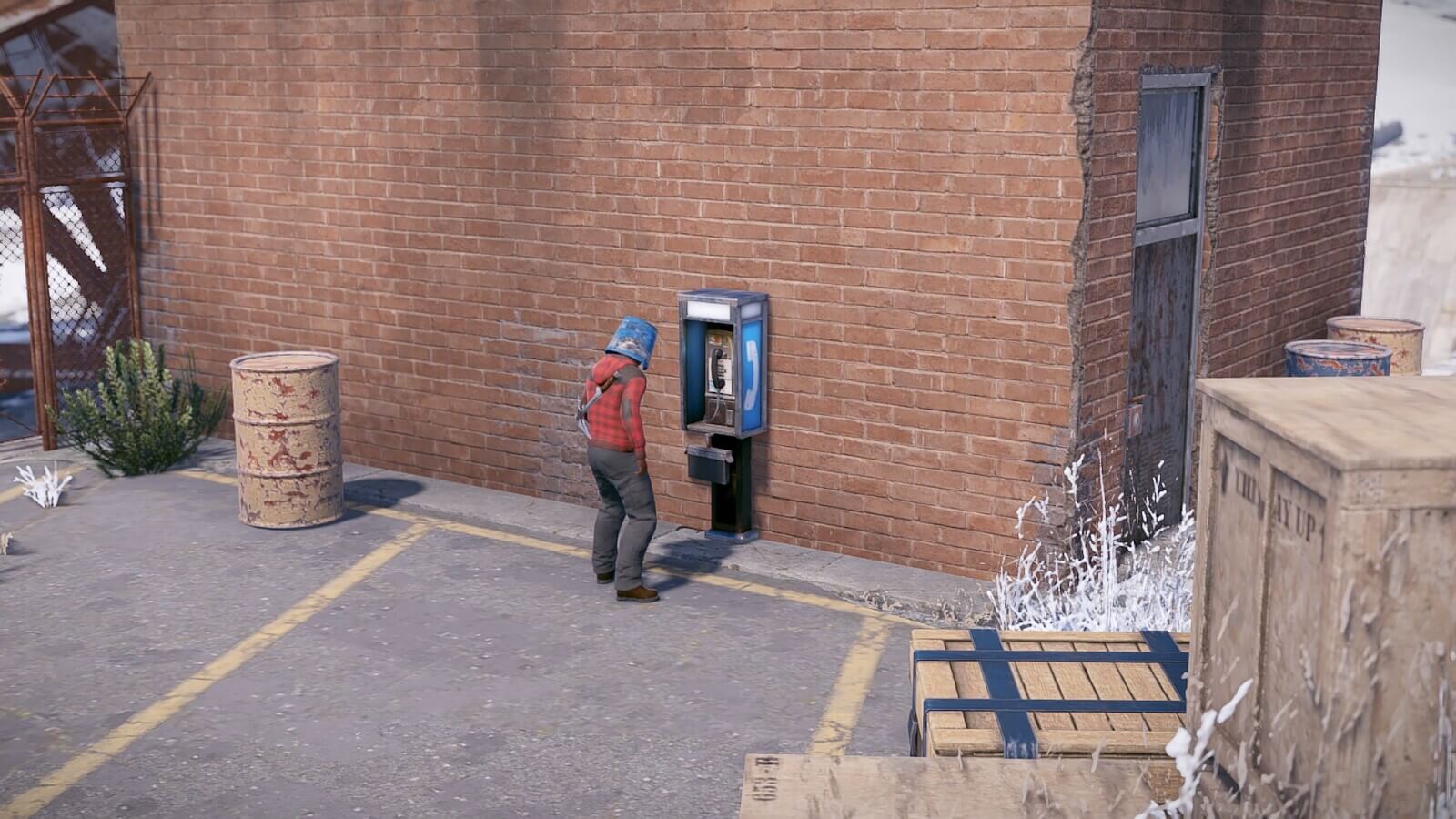 Located next to the single brick structure in the middle of the satellite monument you'll find a telephone. Not entirely useful, but it's there.